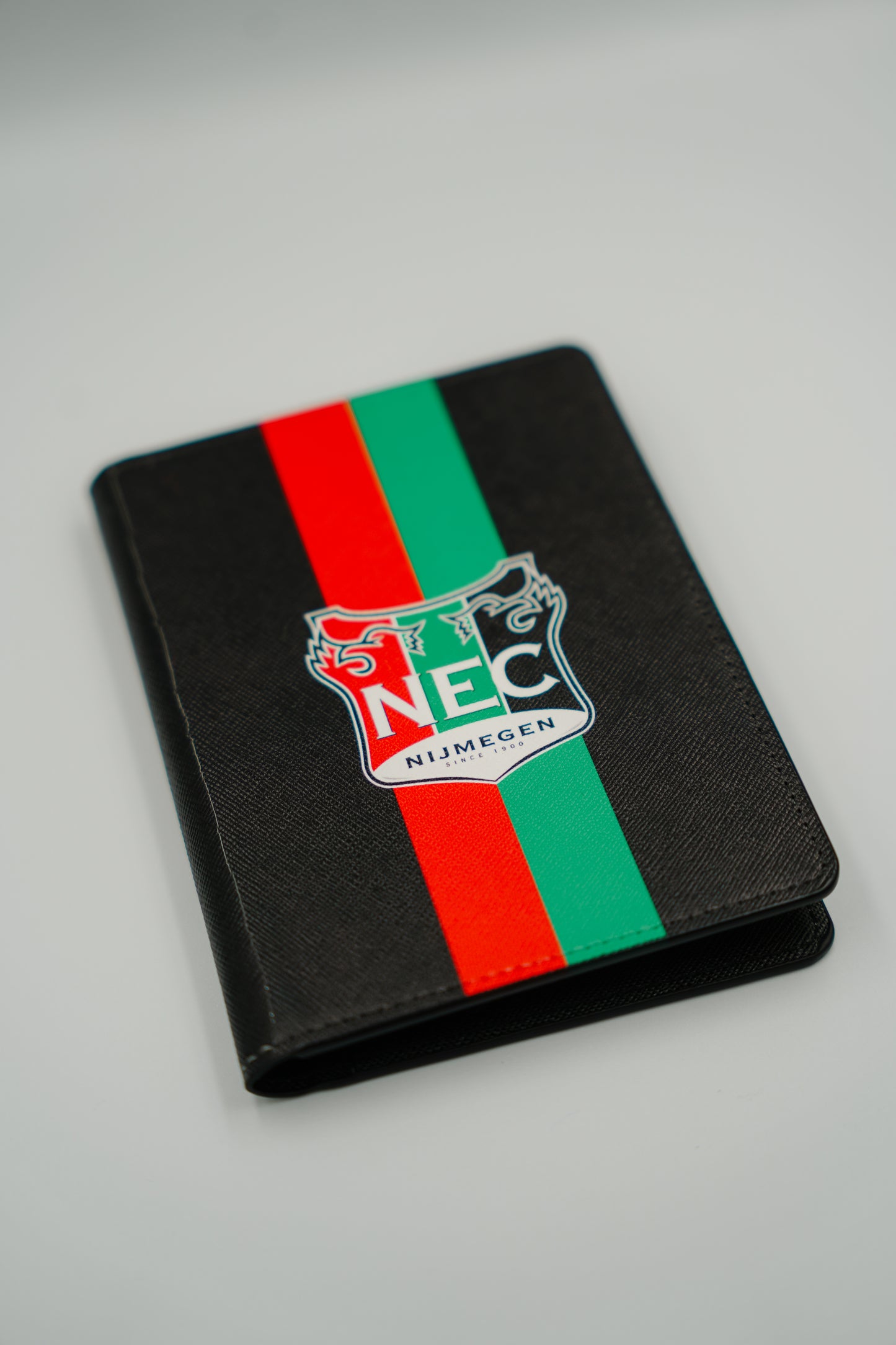 N.E.C. Passport Holder